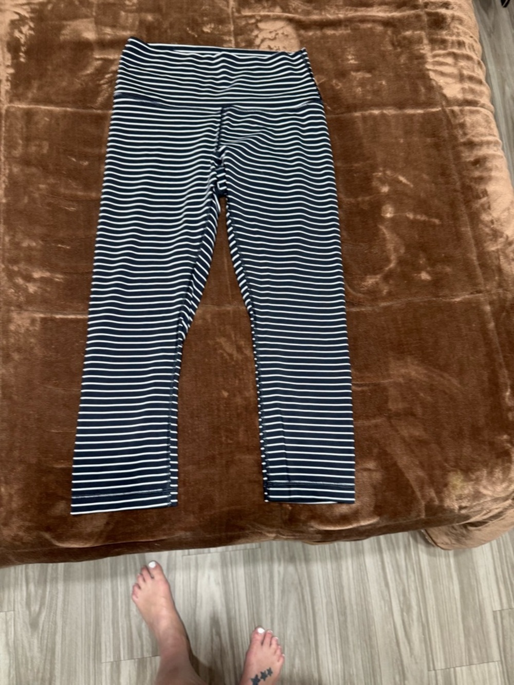 Woman’s size 8 lululemon black and White Striped Leggings